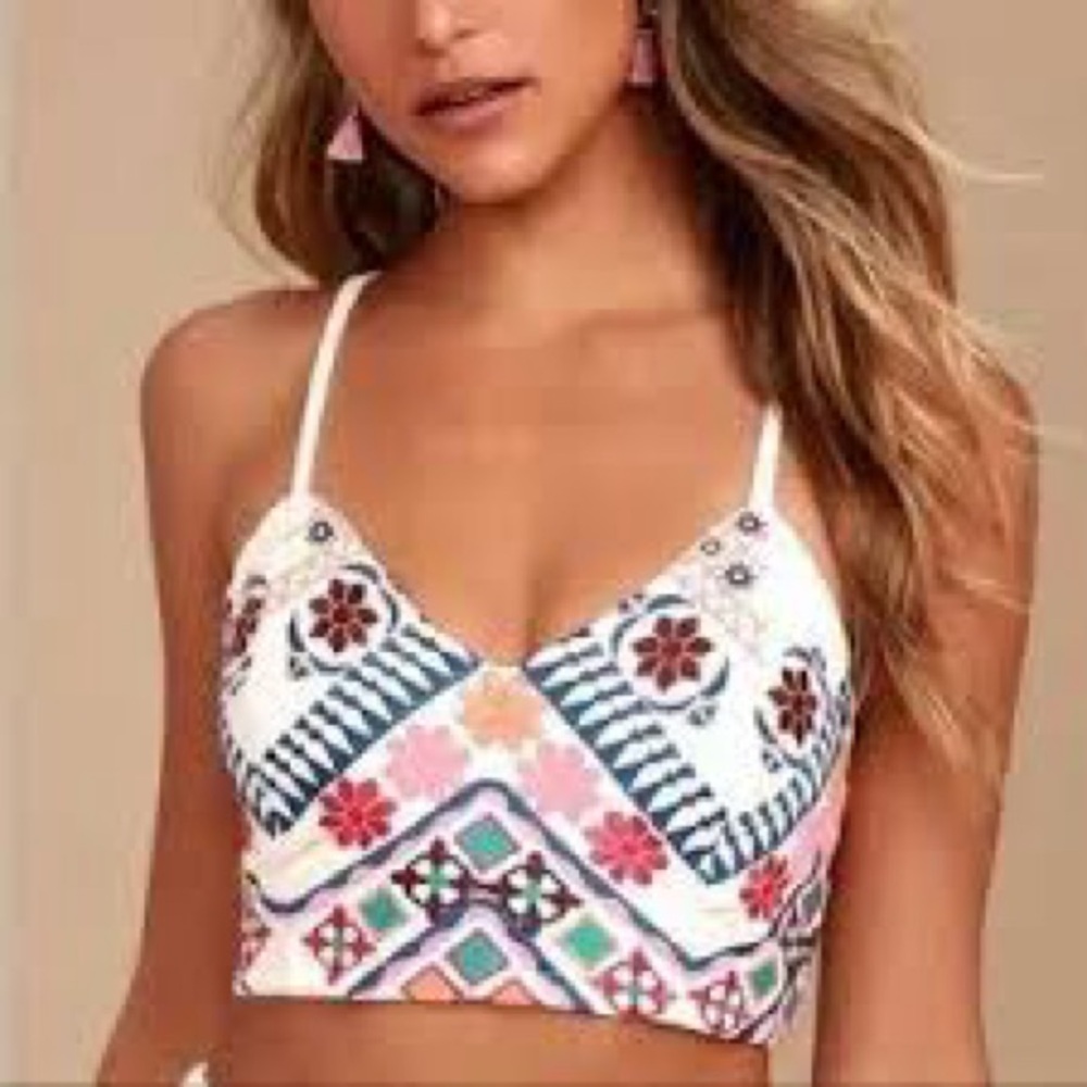 Lulu’s Rhythm Gonna Get You white embroidered crop top.